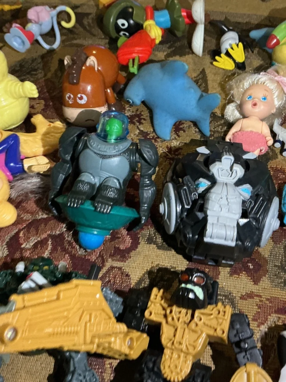 32 Miscellaneous small Toy lot with NBA Bionicle looney tune barbie and more